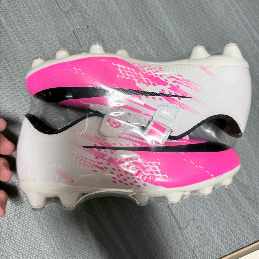 White and Pink Soccer Cleats